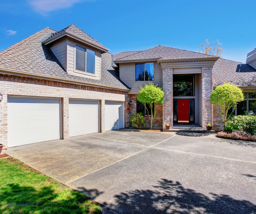residential house with concrete patio and driveway